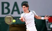 Cancer beaten, gritty Suarez Navarro falls on return