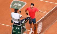 French Open PIX: Big three advance; Barty retires