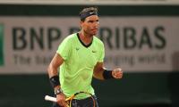 Birthday boy Nadal produces masterclass to advance