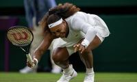 Wimbledon defends 'slippery' courts