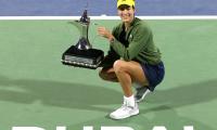 Muguruza relieved to end trophy drought with Dubai win