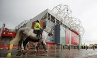 Liverpool arrive at Old Trafford amid fan protest