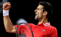 Djokovic outlasts Sonego to set up Nadal final