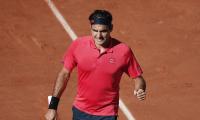 French Open PIX: Federer dazzles; Serena survives