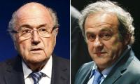 Swiss authorities charge Blatter, Platini with fraud