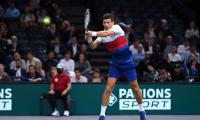 Djokovic made to work for win in Paris Masters