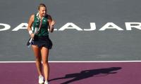 WTA Finals PIX: Kontaveit advances, Muguruza survives