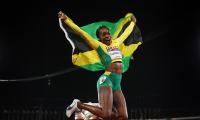 PHOTOS: Thompson-Herah, Omanyala win CWG 100m run