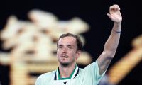 Medvedev channels 'inner Novak' to make semis