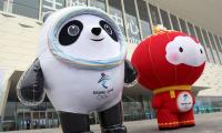 Beijing Games: Hugs discouraged but condoms available