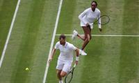 Lure of Wimbledon grass too much for Venus to resist