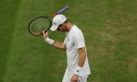 Murray's Wimbledon hopes CRUSHED by Isner 