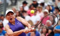 Halep, Azarenka advance in Rome