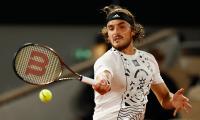 French Open: Tsitsipas, Halep survive scares