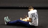 Laver Cup: Protester sets arm on fire on court