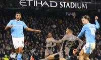 EPL PIX: City held, Liverpool move second