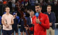 Tennis: Djokovic battles from brink for Adelaide crown