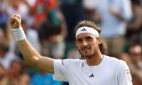 PHOTOS: Tsitsipas, Berrettini move to last 16