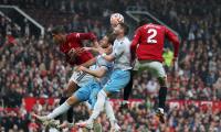 EPL PIX: City, United lose; Spurs sink Liverpool