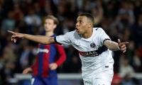 Mbappe powers PSG past 10-man Barca into CL semis