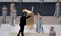 PIX: Paris organisers receive Olympic flame in Athens