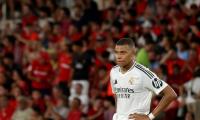 Mbappe glad to leave struggles behind him