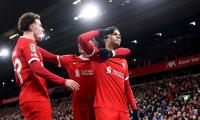 Soccer PIX: Liverpool beat Fulham; Real edge Atletico