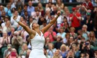 Wimbledon PIX: Defending champ Vondrousova dumped out