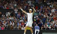 Wimbledon PIX: Sinner, Alcaraz advance; Ruud shocked