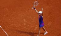 Swiatek eyes historic fourth French Open crown