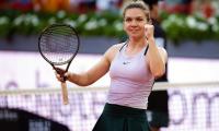 Halep set to return to tennis after doping ban cut