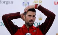 Djokovic's 100th title dream lives on