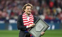 World Cup star Forlan takes up tennis racket