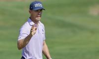 Later, gator! Horschel shoos alligator off with club