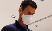 Djokovic says he was 'poisoned' in Melbourne