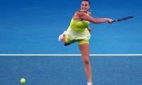 Sabalenka sizzles on rain-hit day at Australian Open