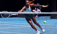 AO PIX: Gauff wins thriller, Swiatek scrapes through