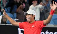 Pizza perfect! Tien celebrates matching Sampras record