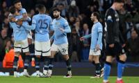 CL PIX: Man City survive scare, Real storm through