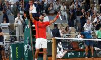 PIX: Djokovic eases into last 16 with 99th French Open win