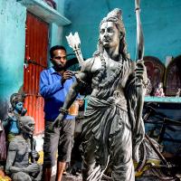 Artisan gives a final touch to a sculpture of Lord Ram during preparations ahead of the foundation laying ceremony of Ram Temple, in Ayodhya.