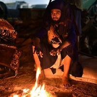 A Nihang sikh braves the biting cold during the farmers' protest at Delhi