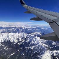 An aerial view of snow covered mountains in Kashmir