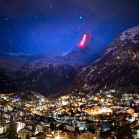 The iconic Matterhorn mountain is illuminated by Swiss light artist Gerry Hofstetter aiming to send messages of hope, support and solidarity to the ones sufferings from the global coronavirus disease, COVID-19, pandemic in the alpine resort of Zermatt, Switzerland