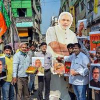 BJP workers in Varanasi celebrate the NDA's lead in the Bihar polls