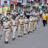 Cops conduct a march in Sangli