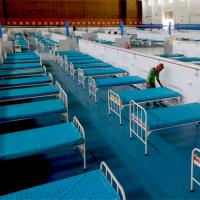 Beds being prepared at a facility for Covid patients
