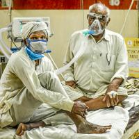 Two patients to a bed as India's healthcare systems fail