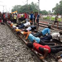 rmy aspirants perform pushups on a railway track in Dhanbad
