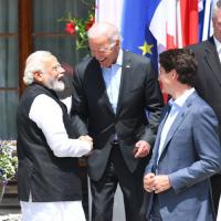Modi shares a laugh with the US President and the Canadian PM